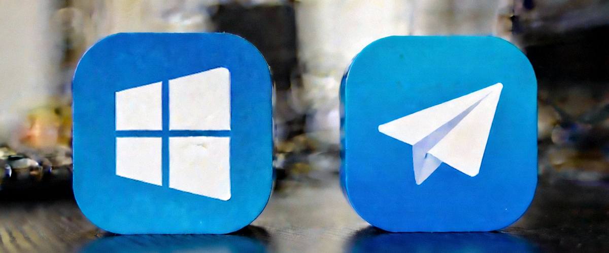 Windows和macOS系统桌面上Telegram应用图标特写，背景模糊，突出显示多平台支持